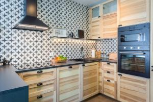 Una cocina o kitchenette en Apartments Cesare with Shared Pool