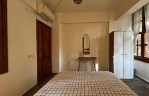 Postel nebo postele na pokoji v ubytování Kuyu Beergarden Hostel