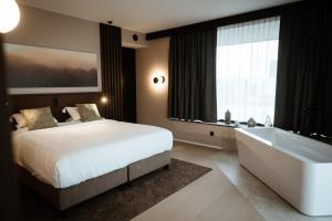 Posteľ alebo postele v izbe v ubytovaní Anatura Hotel Luxembourg