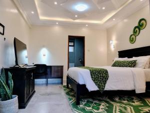 Postel nebo postele na pokoji v ubytování Park Place Hotel