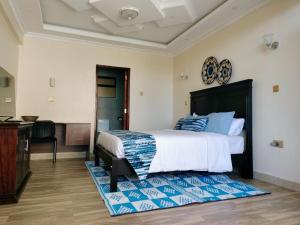 Postel nebo postele na pokoji v ubytování Park Place Hotel