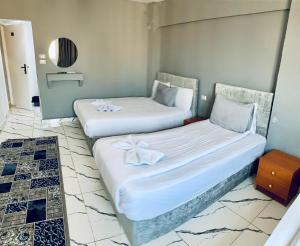 Voodi või voodid majutusasutuse NADA - HOTEl toas
