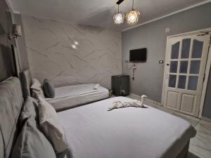 Voodi või voodid majutusasutuse NADA - HOTEl toas