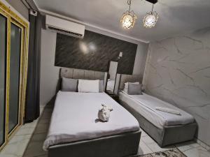 Voodi või voodid majutusasutuse NADA - HOTEl toas