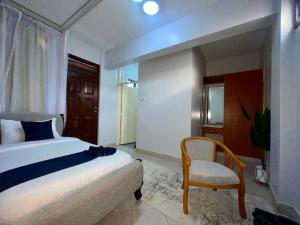 Iman Hotel客房内的一张或多张床位