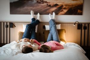 Posteľ alebo postele v izbe v ubytovaní Anatura Hotel Luxembourg