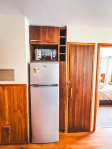 Kuchyň nebo kuchyňský kout v ubytování Cómodo apartamento entero en Pucón