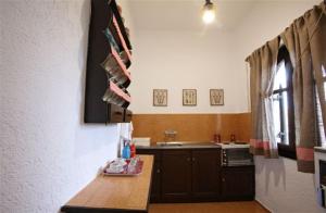 Televízia a/alebo spoločenská miestnosť v ubytovaní Elounda Relax Apartment