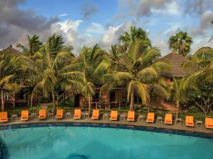 Bazén v ubytování Movenpick Resort Lamantin Saly nebo v jeho okolí