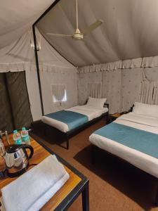 Postel nebo postele na pokoji v ubytování Glampers Resort + 8 fotografií