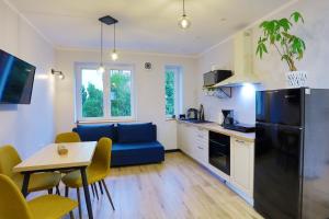 Kuchyň nebo kuchyňský kout v ubytování Sigma Bay