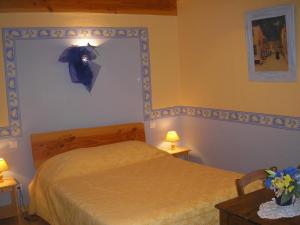 Postel nebo postele na pokoji v ubytování Chambre D'hôtes Myrtille