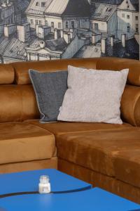Posedenie v ubytovaní Stylish Apartment in the Heart of Kazimierz in Kraków by Noclegi Renters