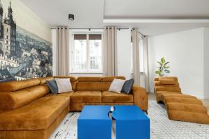 Posedenie v ubytovaní Stylish Apartment in the Heart of Kazimierz in Kraków by Noclegi Renters
