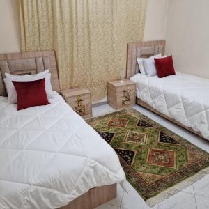 Katil atau katil-katil dalam bilik di Appartement PROPRE au centre de Tanger