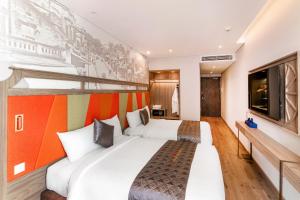 Ένα ή περισσότερα κρεβάτια σε δωμάτιο στο Mandala Apartment & Resort Chambay - Just 15 mins from Mui Ne Hon Rom