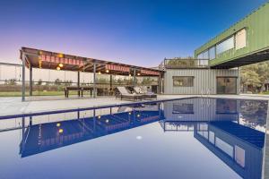 an image of a house with a pool of water at ELIVAAS Hidden Oasis 4BHK with Pool, Mud House & Container House in Dhauj +96 photos