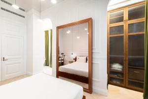 Postel nebo postele na pokoji v ubytování Emerald Hotel Athens