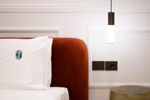 Postel nebo postele na pokoji v ubytování Emerald Hotel Athens