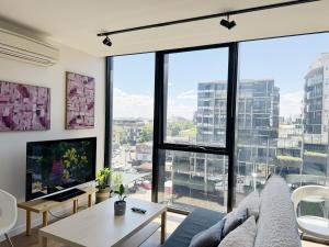 TV a/nebo společenská místnost v ubytování FutureStay AI