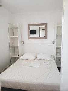 Posteľ alebo postele v izbe v ubytovaní Canet plage T2 + cabine clim et piscine