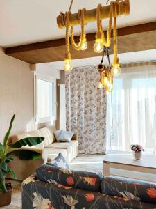 A seating area at SWEET HOME & WELLNESS affittacamere