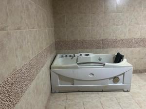 a bathroom with a white sink in the corner at Vacaciones Sol y Luna in La Tebaida +26 photos