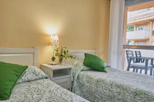 Una cama o camas en una habitación de FGDR322F Cala de la Maza