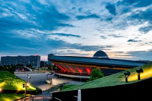 a view of a large building with a sky at URBAN APARTMENTS PREMIUM Baildona 18B, Free Garage, Self Check-in in Katowice