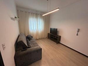 Χώρος καθιστικού στο Apartamento inteiro aconchegante +5 φωτογραφίες