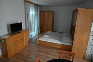 Postel nebo postele na pokoji v ubytování Pension Haus Nova