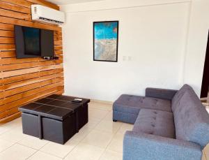 TV a/nebo společenská místnost v ubytování Vista al mar, Mini alberca y roof garden PRIVADO!