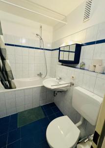 Koupelna v ubytování 1-Zimmer-Wohnung 173 + 2 fotografie