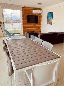 TV a/nebo společenská místnost v ubytování Vista al mar, Mini alberca y roof garden PRIVADO!
