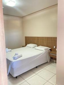 Postel nebo postele na pokoji v ubytování Planeta Hotel