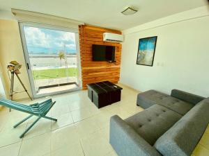 TV a/nebo společenská místnost v ubytování Vista al mar, Mini alberca y roof garden PRIVADO!