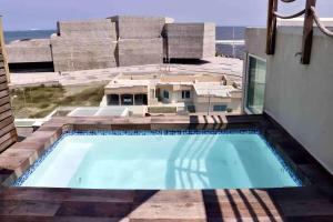 Bazén v ubytování Vista al mar, Mini alberca y roof garden PRIVADO! nebo v jeho okolí
