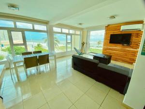 TV a/nebo společenská místnost v ubytování Vista al mar, Mini alberca y roof garden PRIVADO!