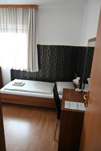 Postel nebo postele na pokoji v ubytování Pension Haus Nova