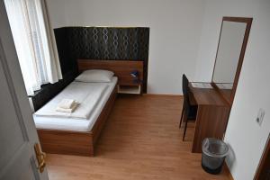 Postel nebo postele na pokoji v ubytování Pension Haus Nova