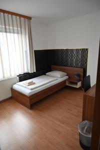 Postel nebo postele na pokoji v ubytování Pension Haus Nova