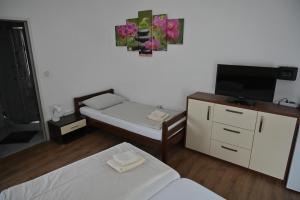 Postel nebo postele na pokoji v ubytování Pension Haus Nova