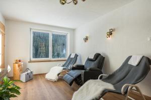 Posedenie v ubytovaní sDahoam Luxury Chalet
