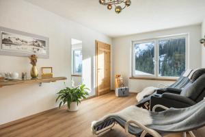 Posedenie v ubytovaní sDahoam Luxury Chalet