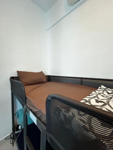 Postel nebo postele na pokoji v ubytování Home at Regalia KLCC
