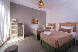 Łóżko lub łóżka w pokoju w obiekcie Venezian View Apartment