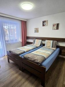 Letto o letti in una camera di Ferienhaus Adonis