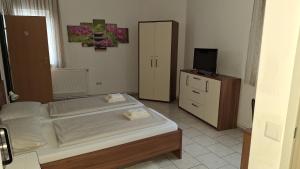 Postel nebo postele na pokoji v ubytování Pension Haus Nova