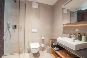 Koupelna v ubytování Hotel Porta Cervino