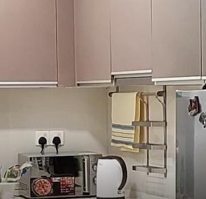 Kuchyň nebo kuchyňský kout v ubytování Home at Regalia KLCC